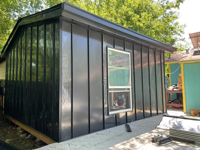 Black standing seam metal wall panels for Metal Roof Installation in Caribou