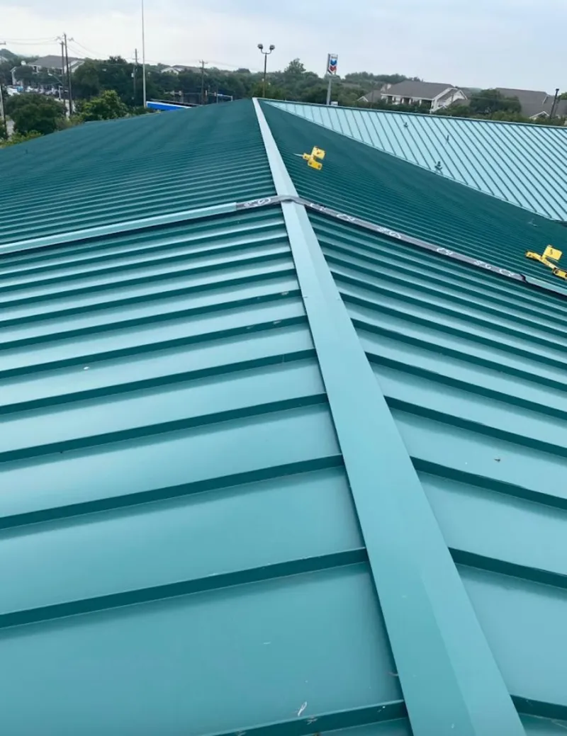 Green commercial metal roof ridge and valley for Metal Roof Repair in Caribou